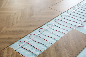 Яке покриття краще обрати для теплої підлоги — ламінат чи плитку? фото